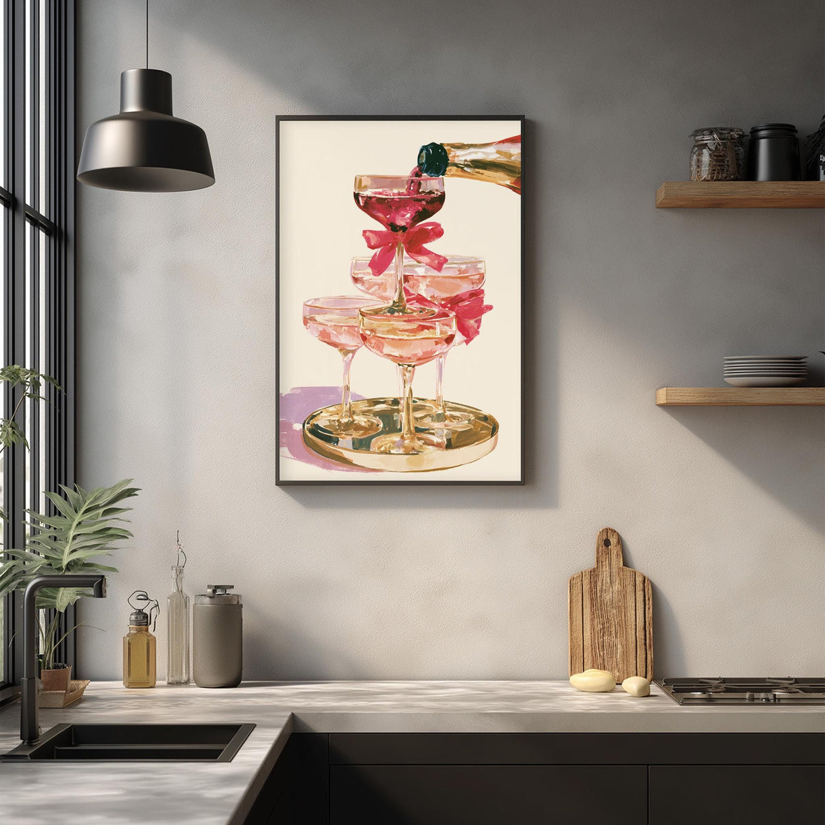 a framed painting of pink champagne glasses on a white background, with a bottle of champagne being poured into one of the glasses.