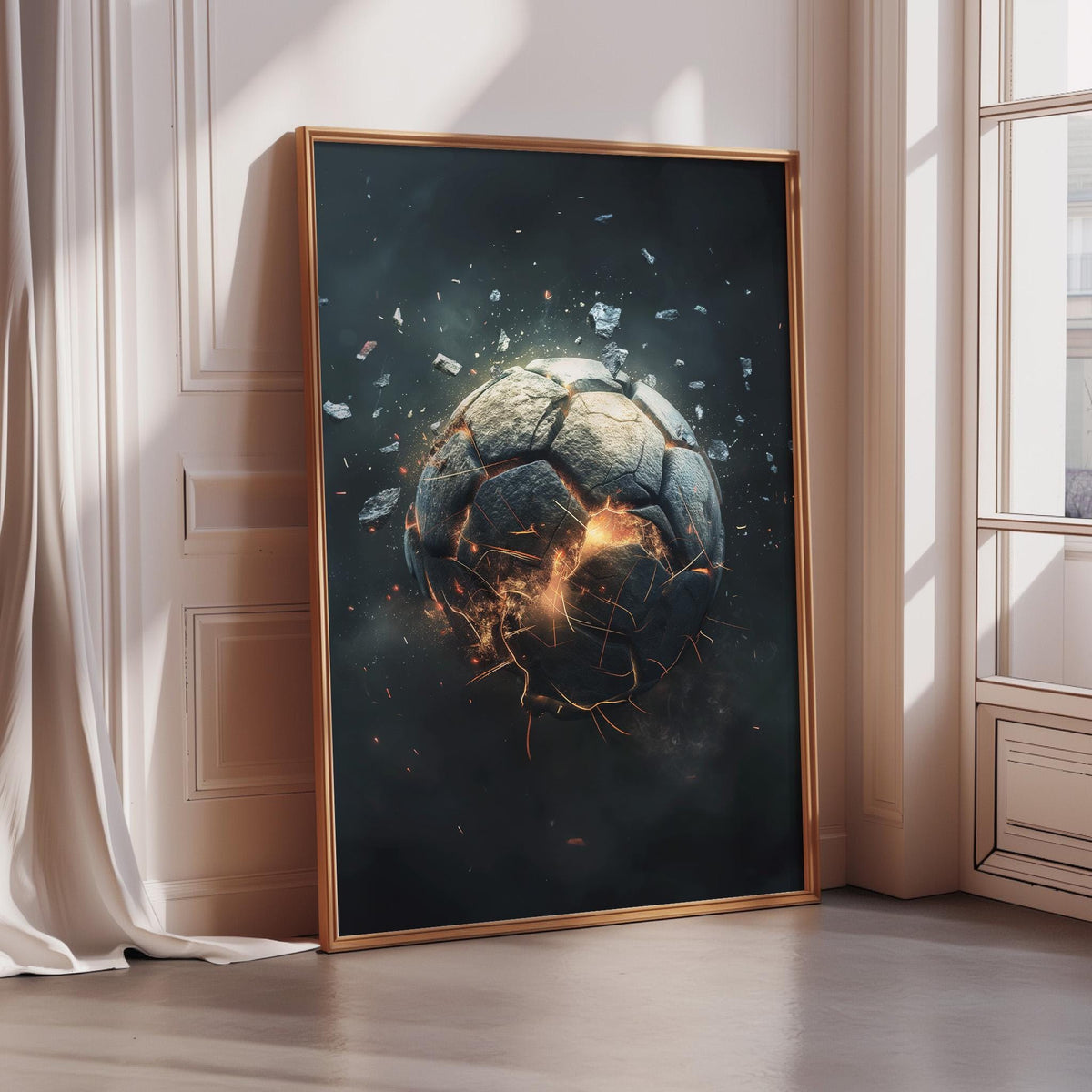 a large, framed poster depicting a soccer ball that has been smashed or cracked, with sparks or flames emanating from it.