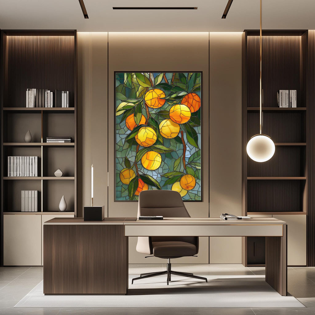 a modern office space with a large framed stained glass artwork of oranges hanging on the wall above a wooden desk. The desk is positioned in front of the artwork, creating a focal point in the room. The office also features built-in bookshelves and a pendant light, contributing to the overall contemporary design.