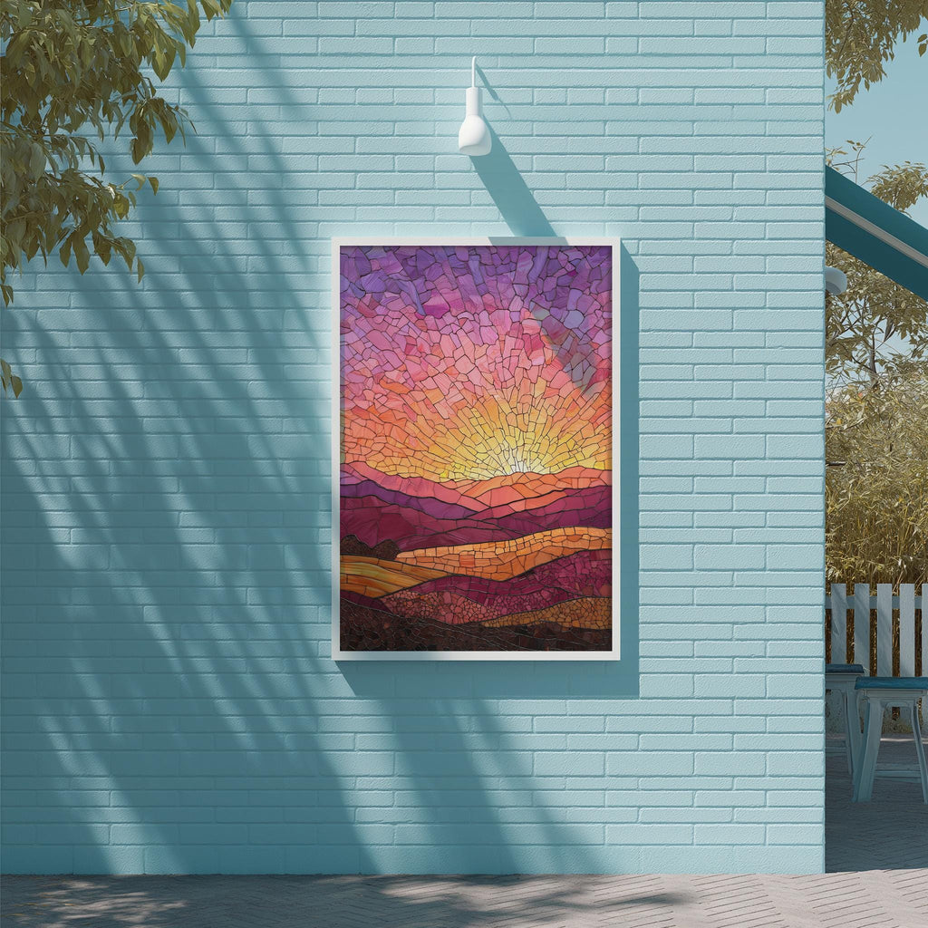 a vibrant stained glass artwork depicting a sunset over a mountainous landscape, mounted on a blue wall.