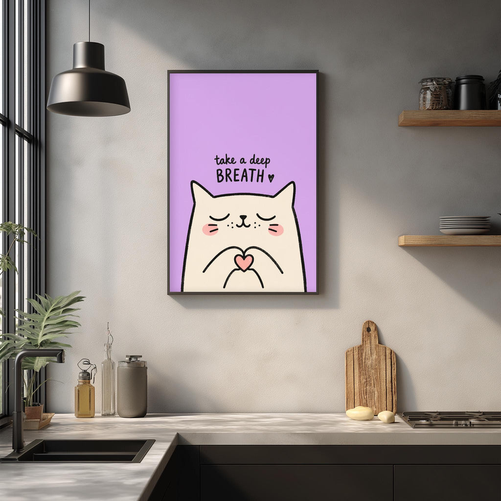 a kitchen counter with a framed poster of a cat and the text "Take a deep breath" above it.