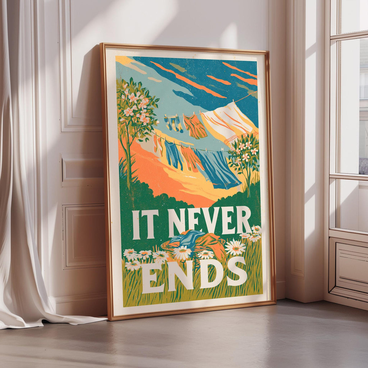 A framed poster with a colorful illustration of a mountain landscape and the text "IT NEVER ENDS" displayed on it.