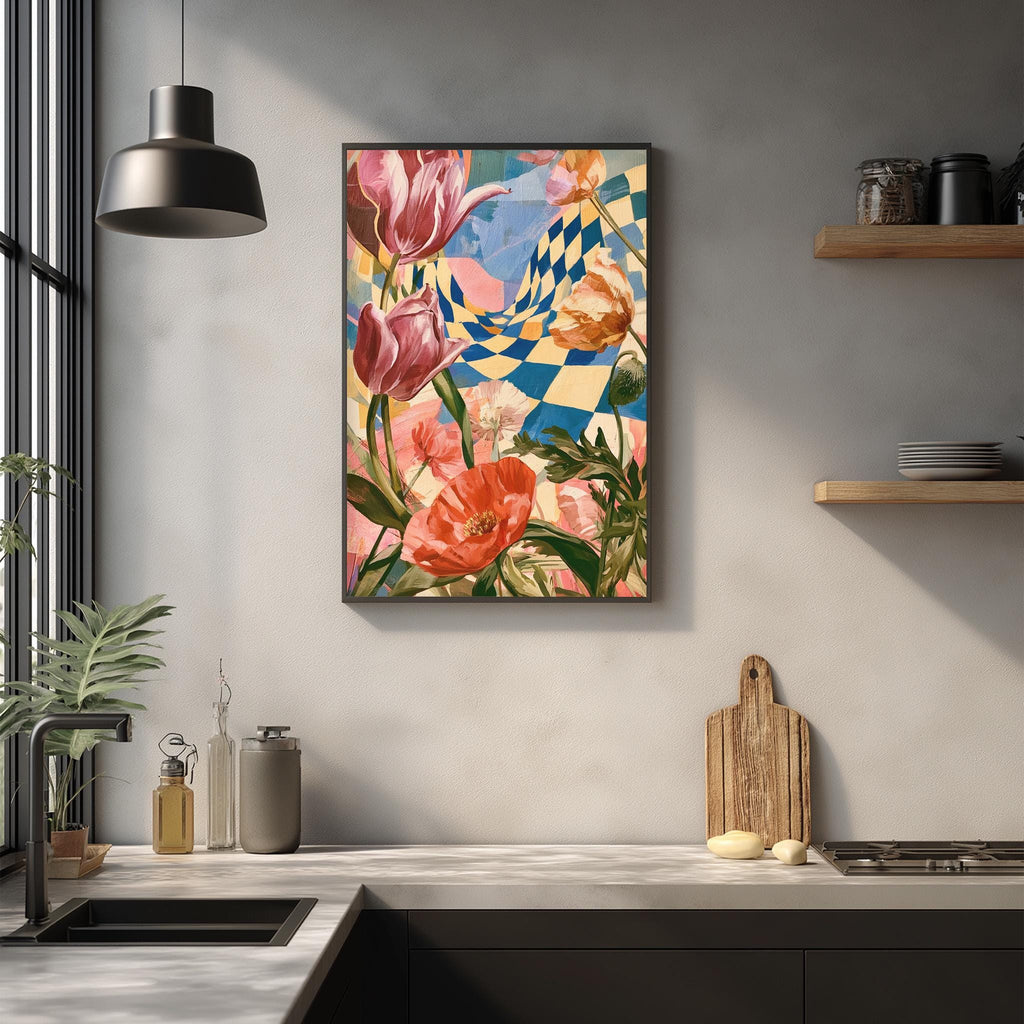 a kitchen counter with a framed painting of colorful flowers hanging above it. The painting is a vibrant display of pink, orange, and yellow flowers, creating a lively and cheerful atmosphere in the kitchen.
