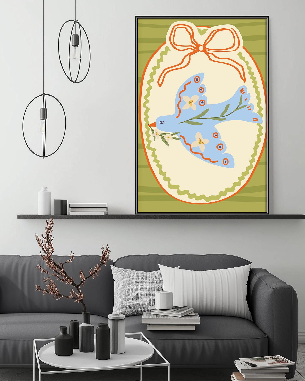 a cozy living room with a gray couch, a coffee table, and a large framed illustration of a blue bird with a bow on a green and yellow background.