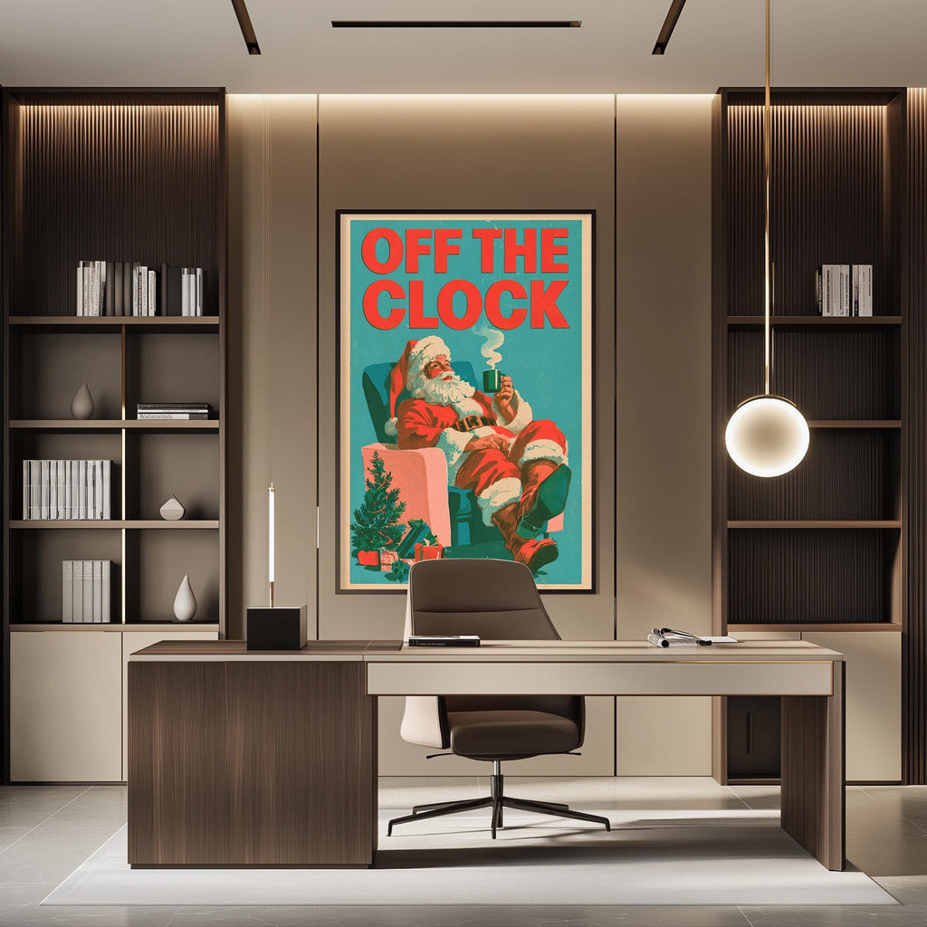 a modern office space with a large framed poster of Santa Claus sitting in a chair in the background. The office has a wooden desk and chair, and there are bookshelves on either side of the desk.