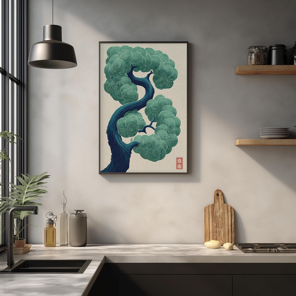a kitchen counter with various items on it, including a framed illustration of a tree with a blue trunk and green leaves, a wooden cutting board, and some kitchen accessories.