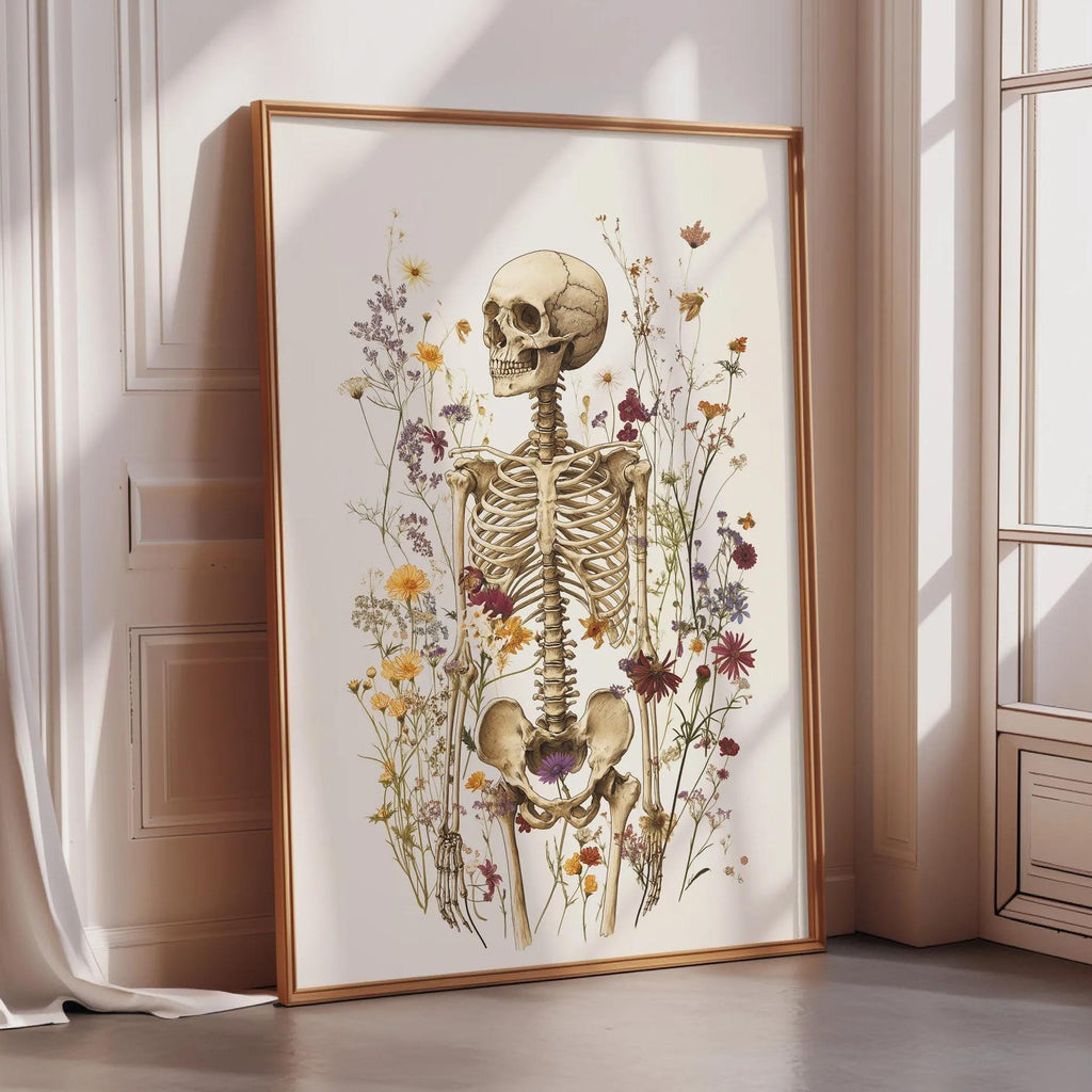a framed illustration of a skeleton surrounded by a variety of flowers and plants.
