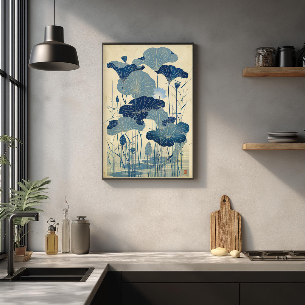 a kitchen counter with a framed artwork of blue lotus flowers hanging on the wall above it. The counter also has various kitchen items such as a cutting board, a bottle, and a vase.