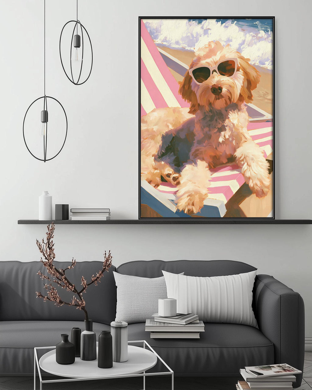 a large framed painting of a dog wearing sunglasses, sitting on a beach towel, with a beach scene in the background.