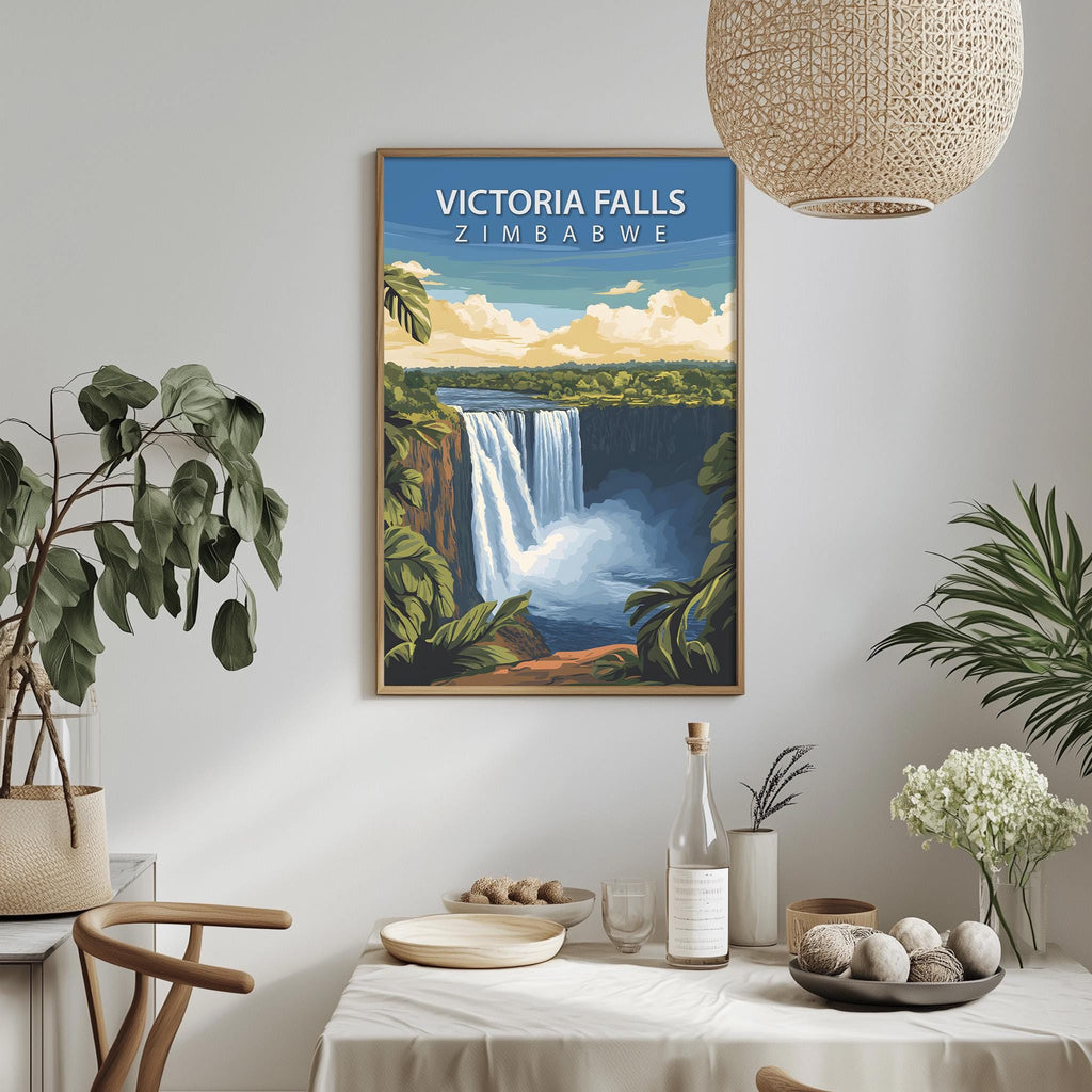 a framed poster of Victoria Falls hanging on a wall, with a dining table and chairs in the foreground.