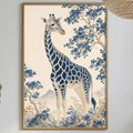 a dining table with a white tablecloth, a bowl of fruit, a bottle, and a vase with flowers. Above the table, there is a framed picture of a giraffe in a blue and white landscape.