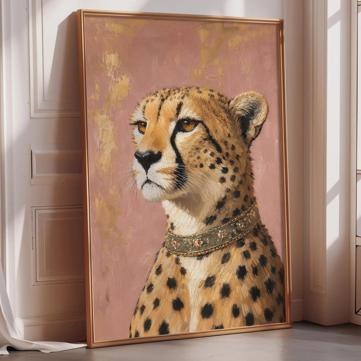 A framed painting of a cheetah with a golden collar is displayed on a wall in a room with a window.