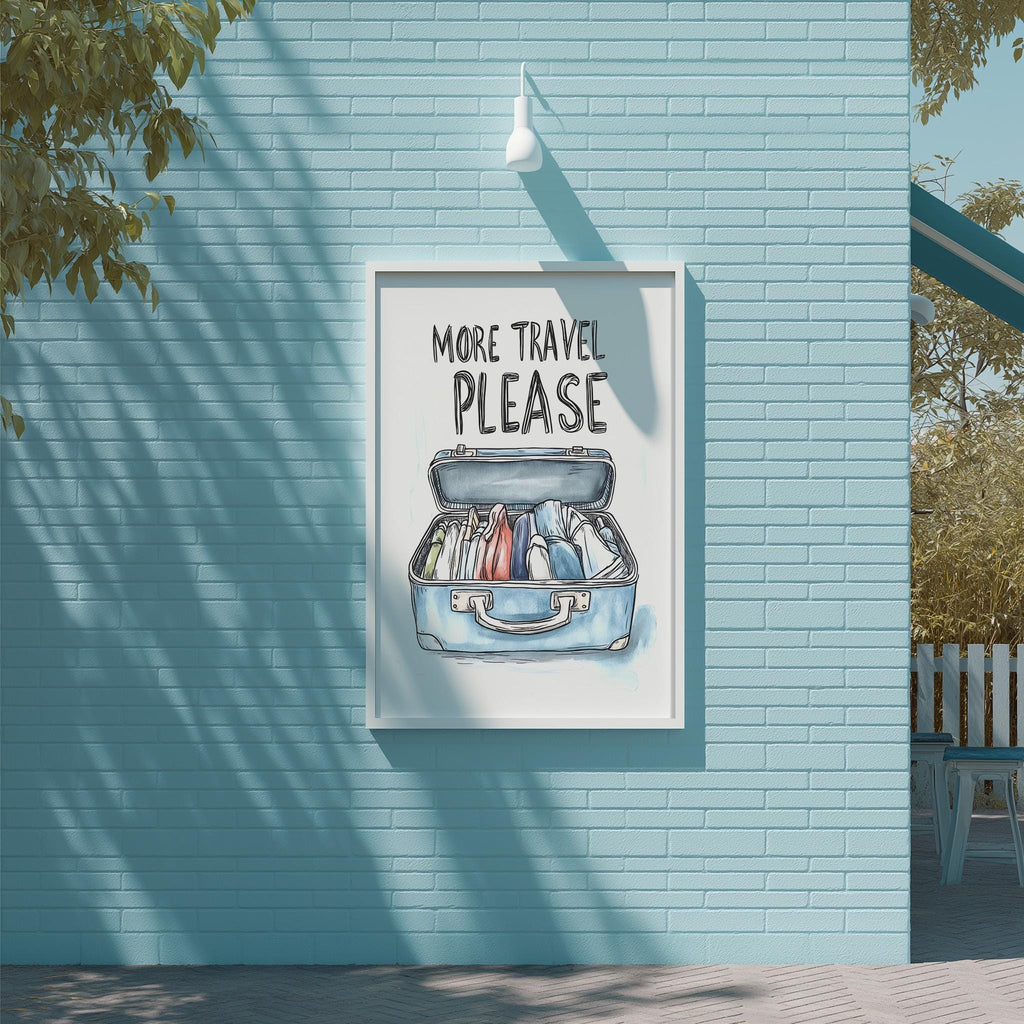 a blue wall with a framed poster that says "MORE TRAVEL PLEASE" and an illustration of a suitcase with various travel items inside.