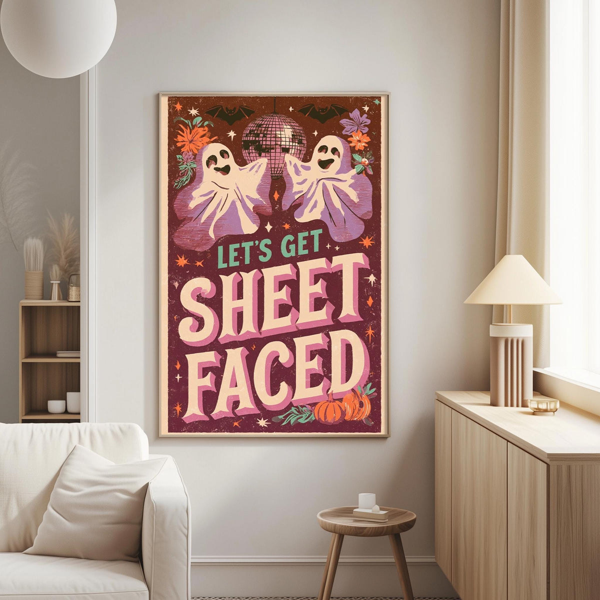 a poster with a Halloween theme, including two ghostly figures and a disco ball, along with the text "Let's Get Sheetfaced" displayed prominently.
