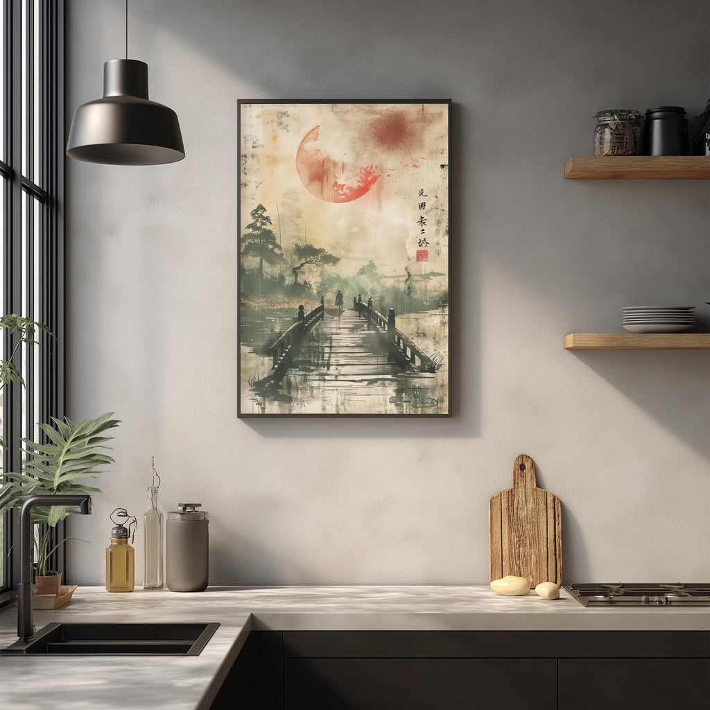 a kitchen counter with various items on it, including a cutting board, a bottle, and a vase. Above the counter, there is a framed artwork depicting a bridge with a red and white design.