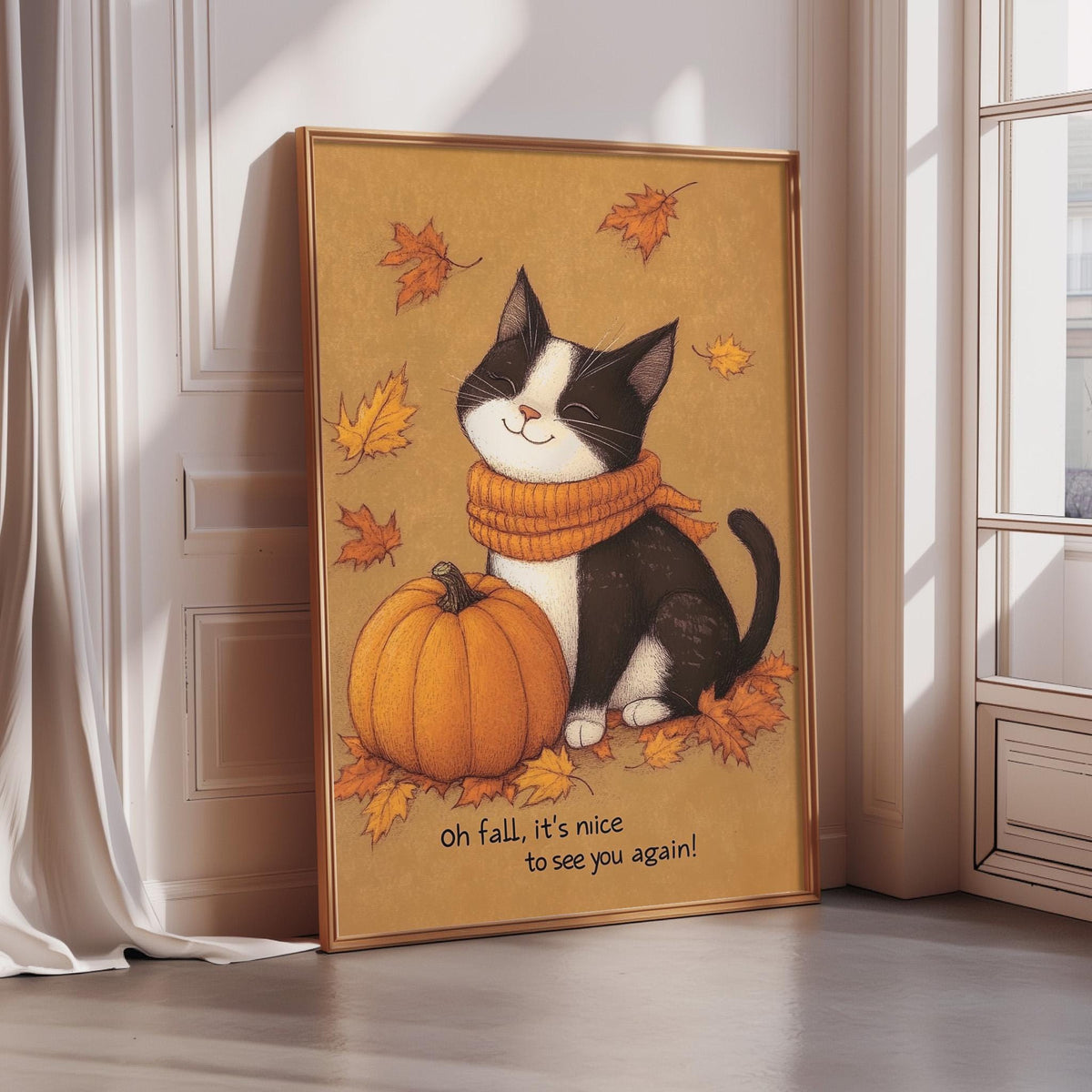 A framed illustration of a black and white cat sitting next to a pumpkin, surrounded by autumn leaves, with the text "oh fall, it's nice to see you again!"