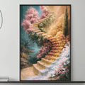 a large, colorful painting of a staircase with flowers and greenery hanging on a wall above a gray couch with white pillows. The painting is framed and appears to be a focal point in the living room setting.