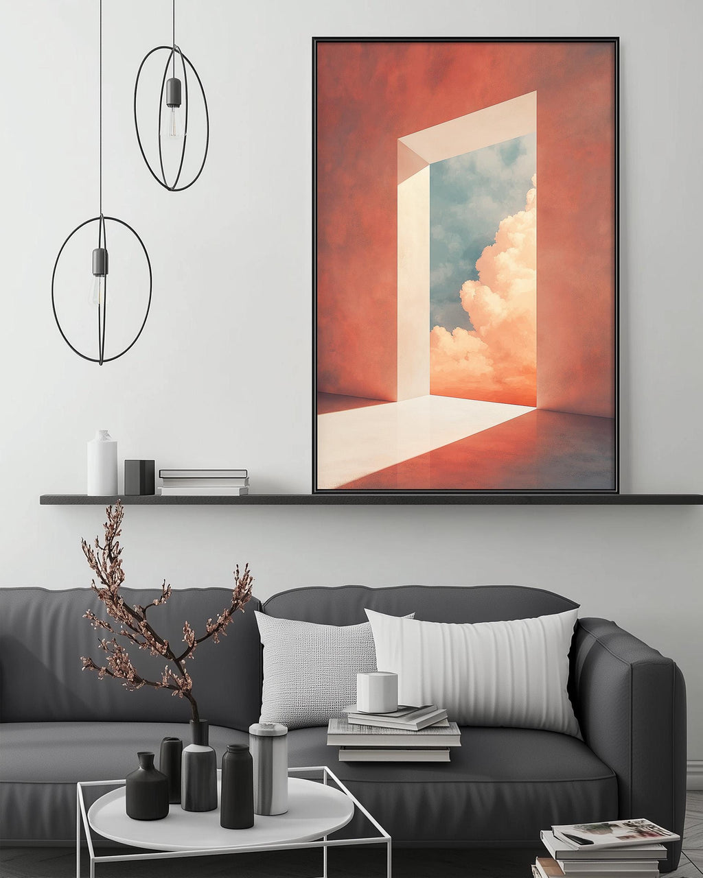 a modern living room with a gray sofa, a coffee table, and a large framed artwork depicting a doorway leading to a sky filled with clouds.