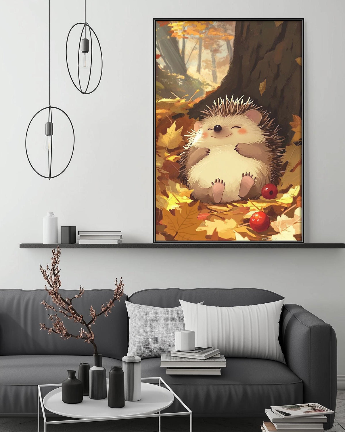 a cozy living room with a gray sofa, a coffee table, and a large framed painting of a hedgehog resting on a bed of autumn leaves. The painting is hanging on the wall above the sofa, creating a warm and inviting atmosphere in the room.
