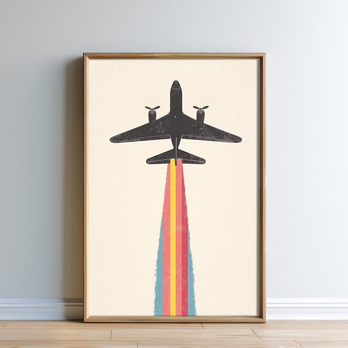 The image is a framed poster depicting a stylized airplane silhouette with a colorful trail behind it, set against a plain background.