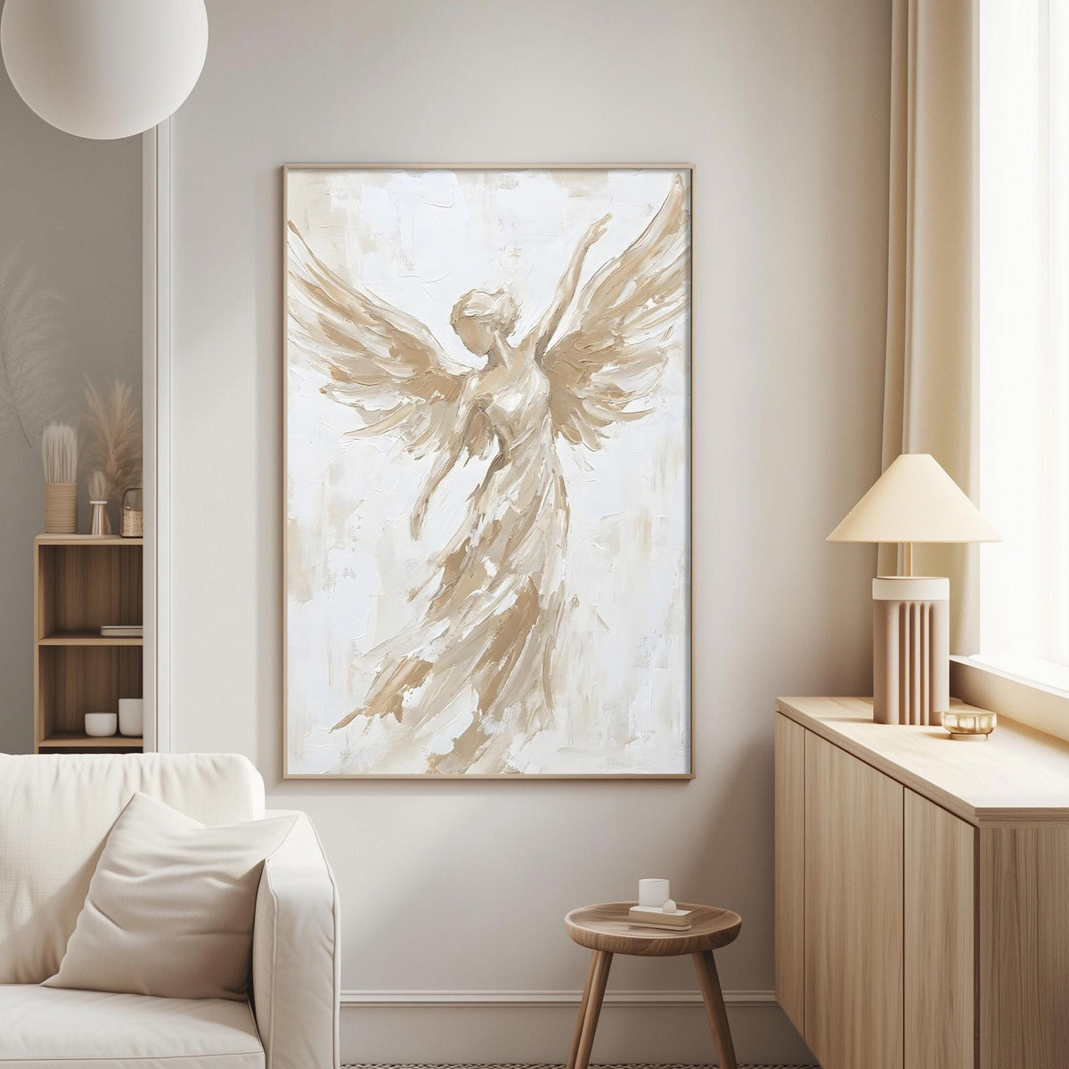 a large painting of an angel with outstretched wings hanging on a wall in a living room.