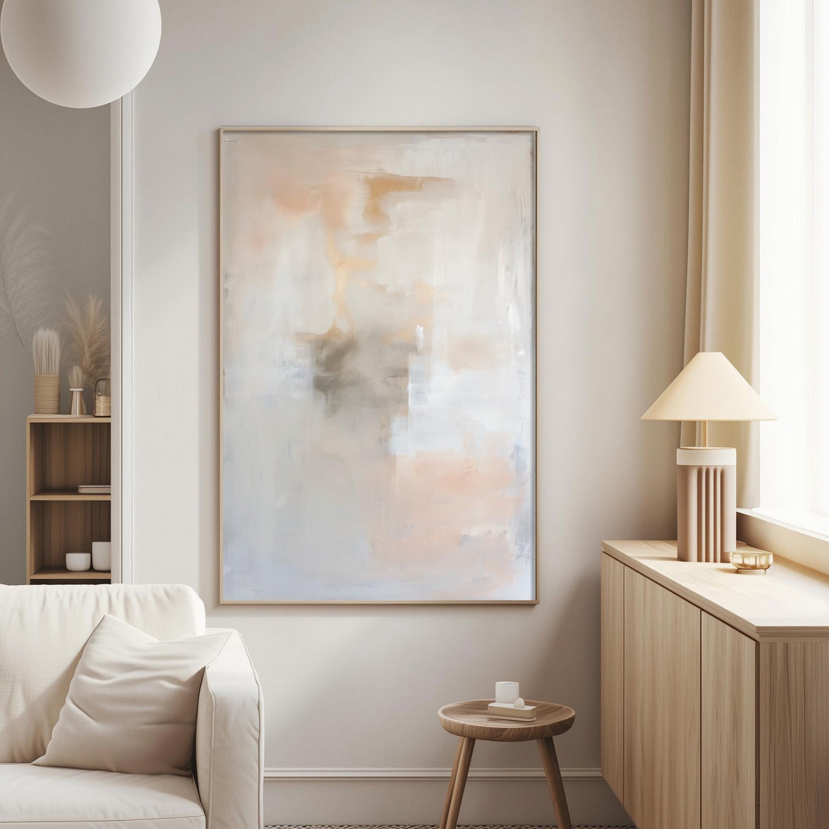 a modern living room with a large abstract painting hanging on the wall, a white sofa, a wooden side table, and a lamp on a wooden cabinet.