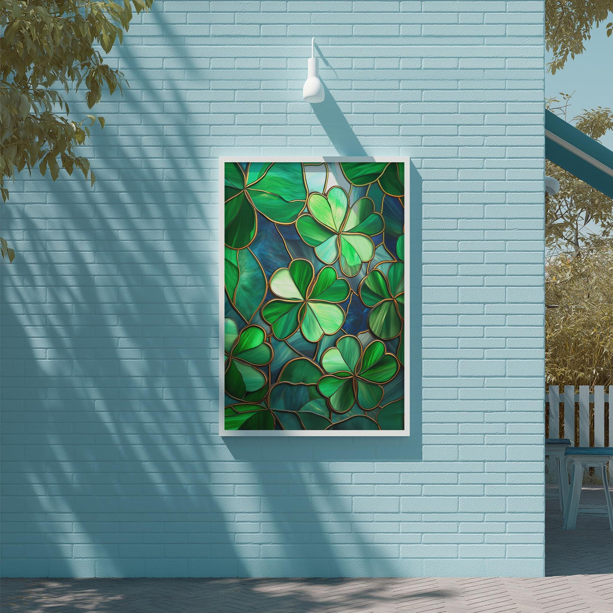 a vibrant stained glass artwork with a green and blue color scheme, hanging on a light blue brick wall.