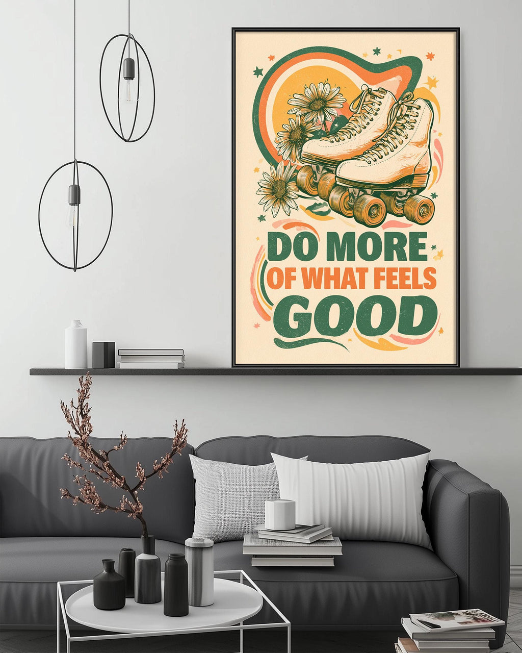 a poster with a roller skate and flowers on it, hanging on a wall above a gray couch with a coffee table in front of it.