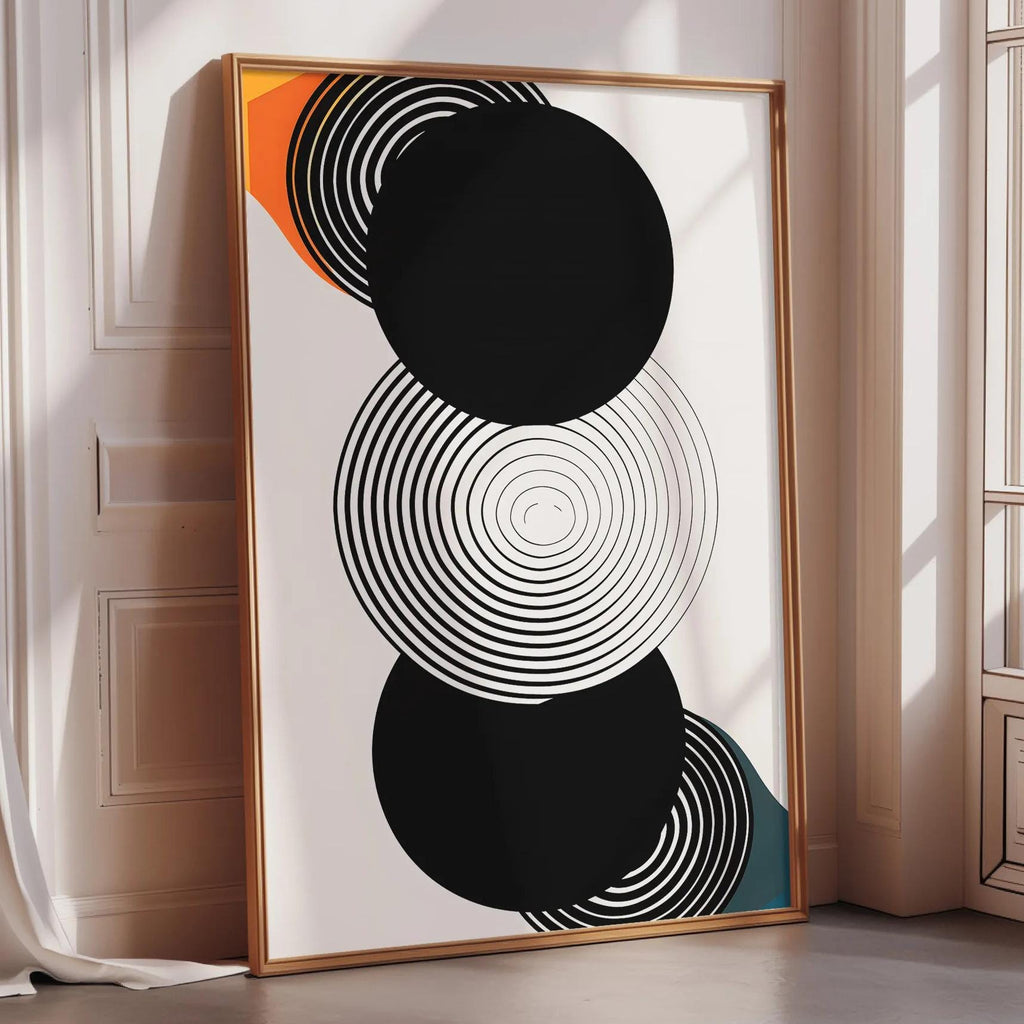 a large abstract art piece with a black and white color scheme, featuring concentric circles and a black background.