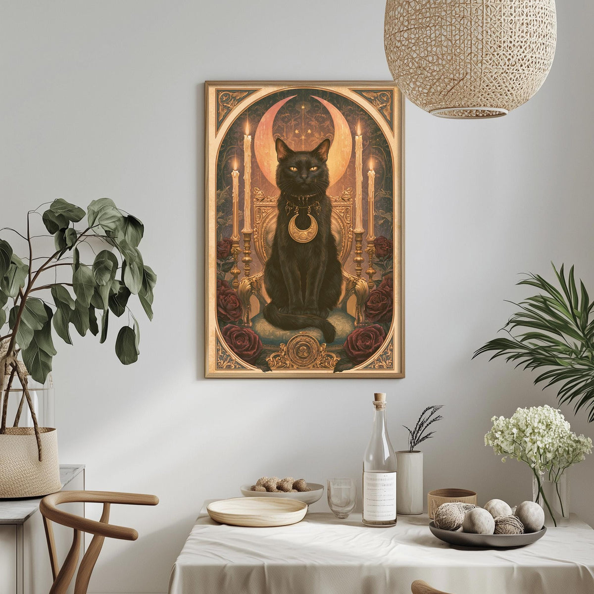 a framed painting of a black cat sitting on a throne, surrounded by candles, flowers, and other decorative elements. The painting is hung on a wall above a dining table with various items on it, including a bottle, a bowl, and a vase.