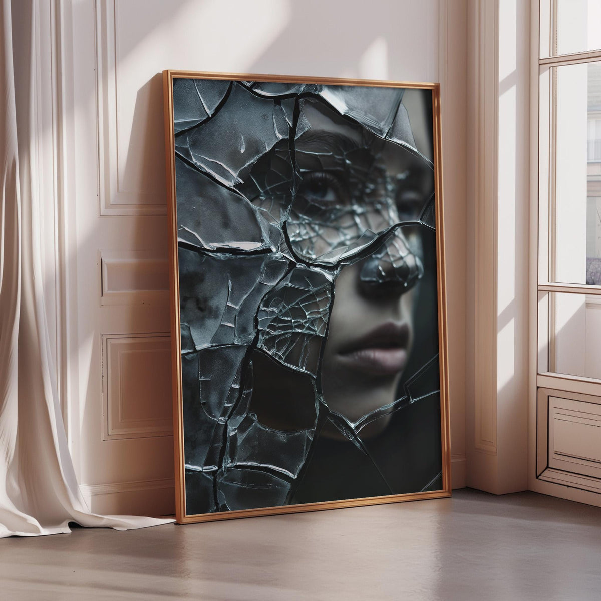 a large, framed artwork depicting a cracked, black face with a pensive expression.