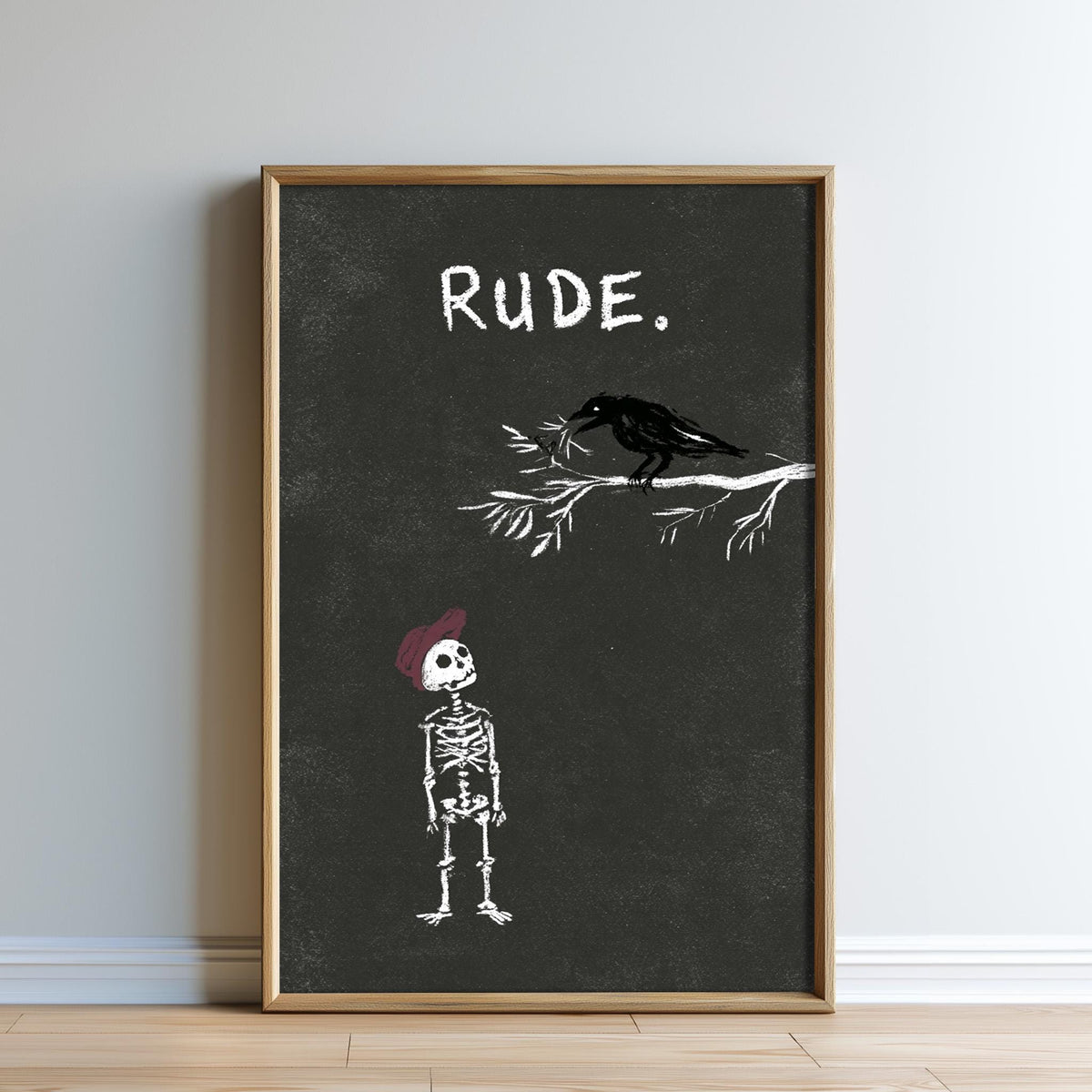 The image is a framed artwork depicting a skeleton wearing a red hat, standing next to a black bird on a branch, with the word "Rude" written above them.
