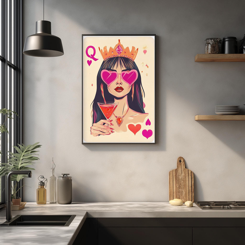 a framed illustration of a woman wearing a crown and sunglasses, holding a drink, with hearts and a deck of cards in the background.