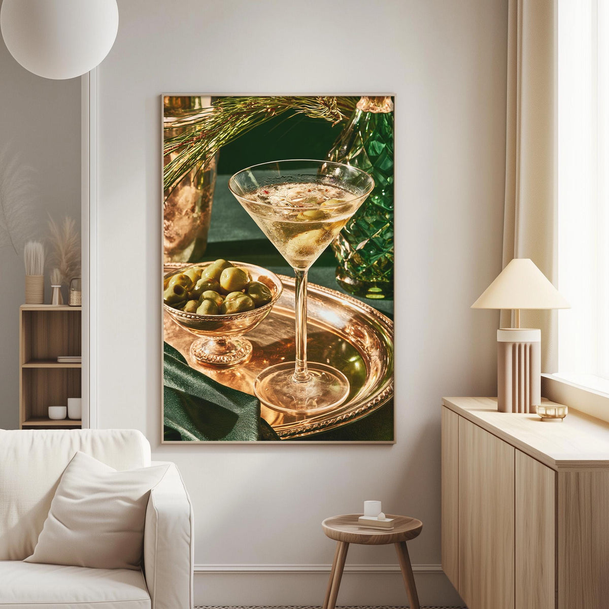a large framed picture of a martini glass filled with a drink, surrounded by a variety of food items, including a bowl of olives and a plate of appetizers.