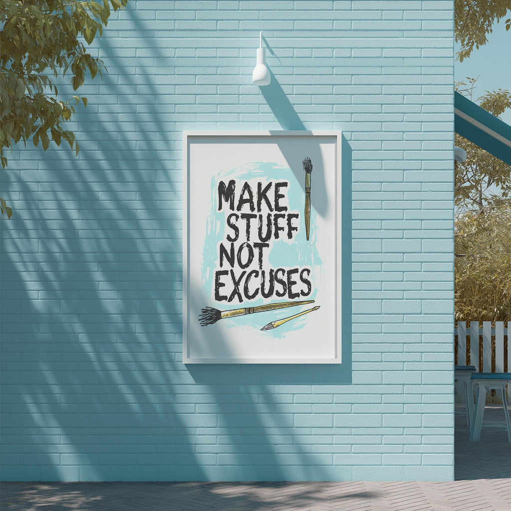 a blue brick wall with a framed poster that reads "MAKE STUFF NOT EXCUSES" and includes illustrations of paintbrushes.