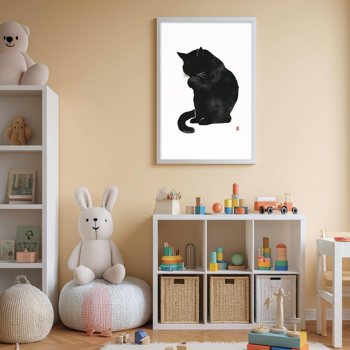 A cozy children's room with a white bookshelf, a stuffed rabbit, a black cat illustration, and a toy train set.