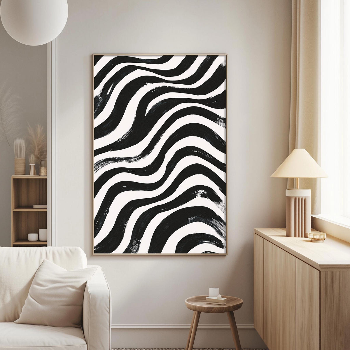 a modern living room with a large black and white abstract painting hanging on the wall. The painting has a striking black and white striped pattern. The room is furnished with a white sofa, a wooden side table, and a lamp. The overall design and decor create a stylish and contemporary atmosphere.