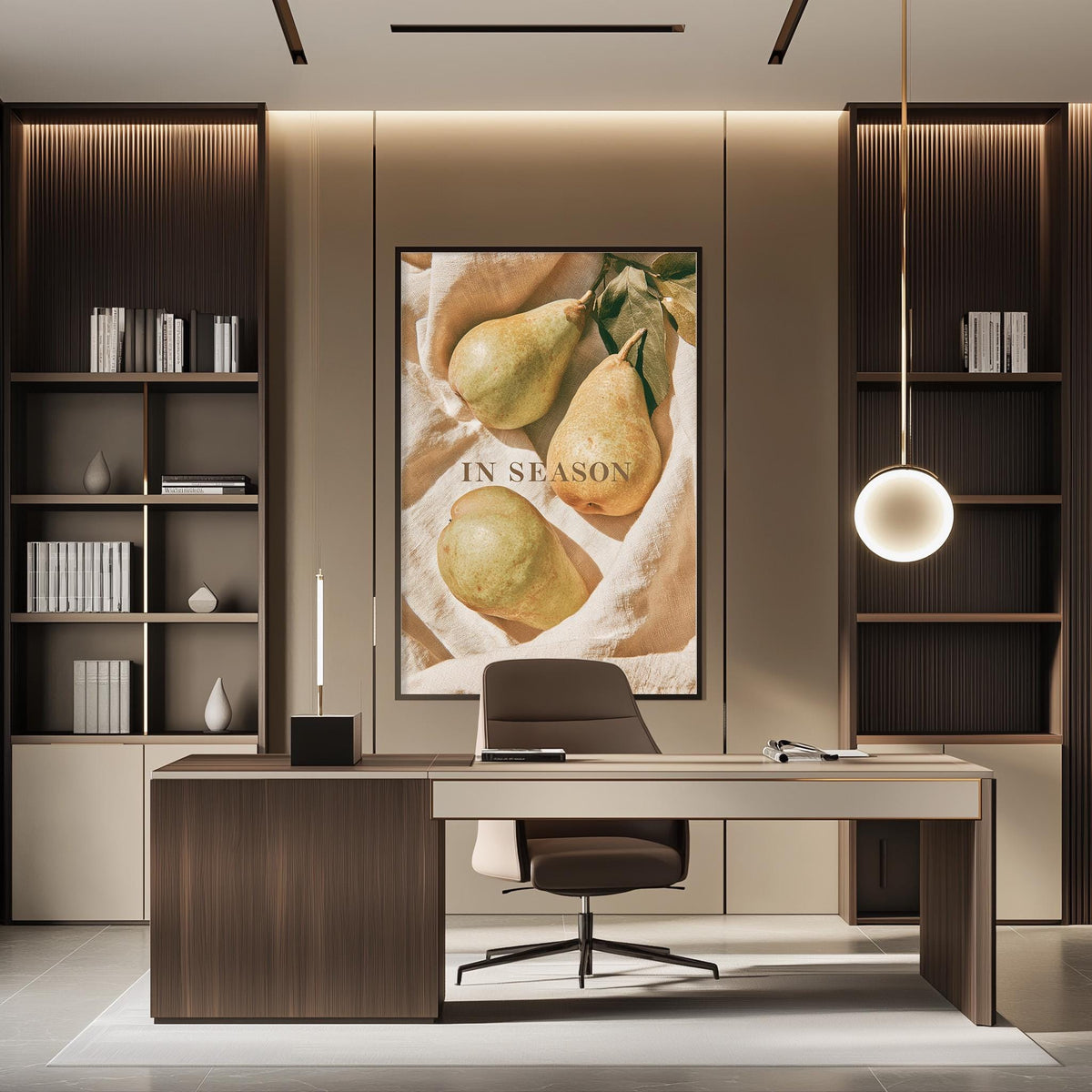a modern office space with a large framed poster of pears on the wall, a wooden desk with a chair, and built-in bookshelves.