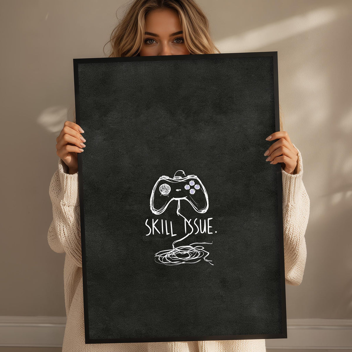 A woman holding a black poster with a white graphic and text on it.
