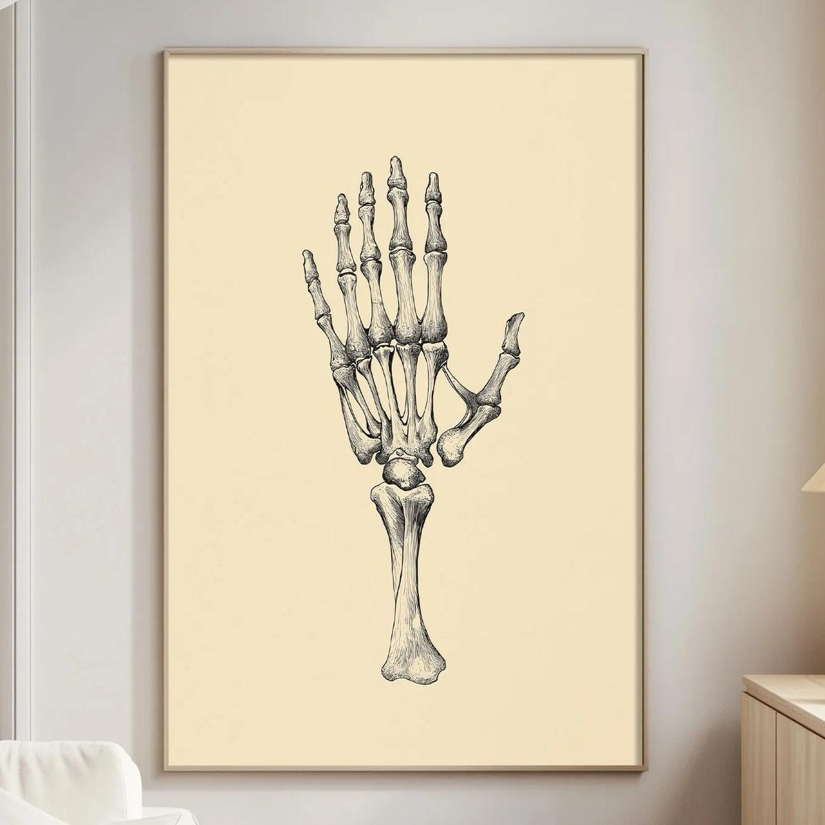 a living room with a large framed illustration of a human hand on the wall.