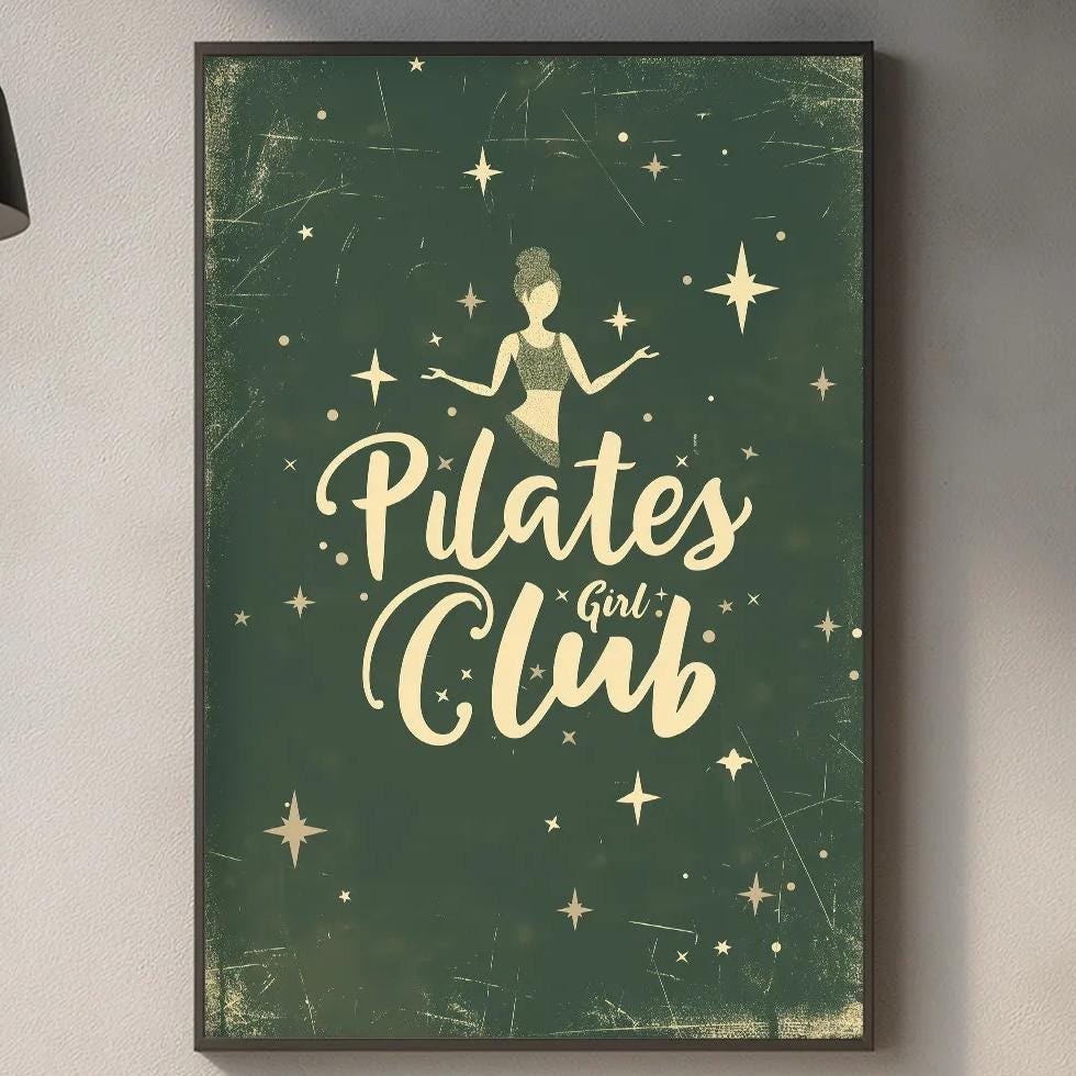 a kitchen counter with various kitchen items, including a cutting board, a sink, and a potted plant. Above the counter, there is a framed poster with the text "Pilates Club" and a starry background.