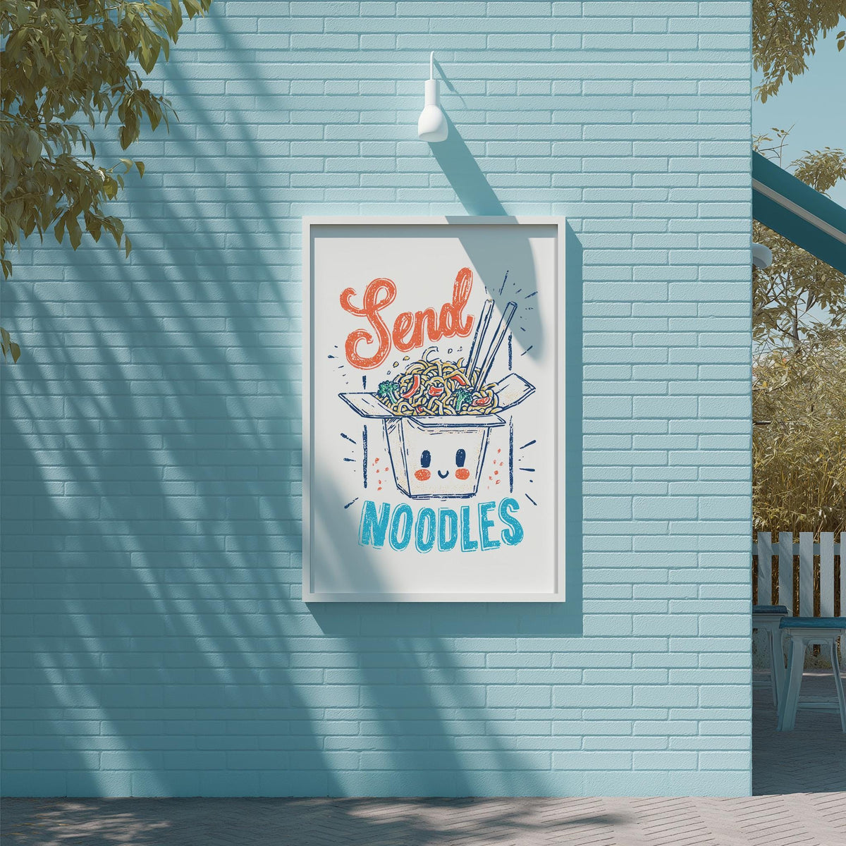 A framed poster with a cartoon noodle character and the text "Send Noodles" is displayed on a blue brick wall.