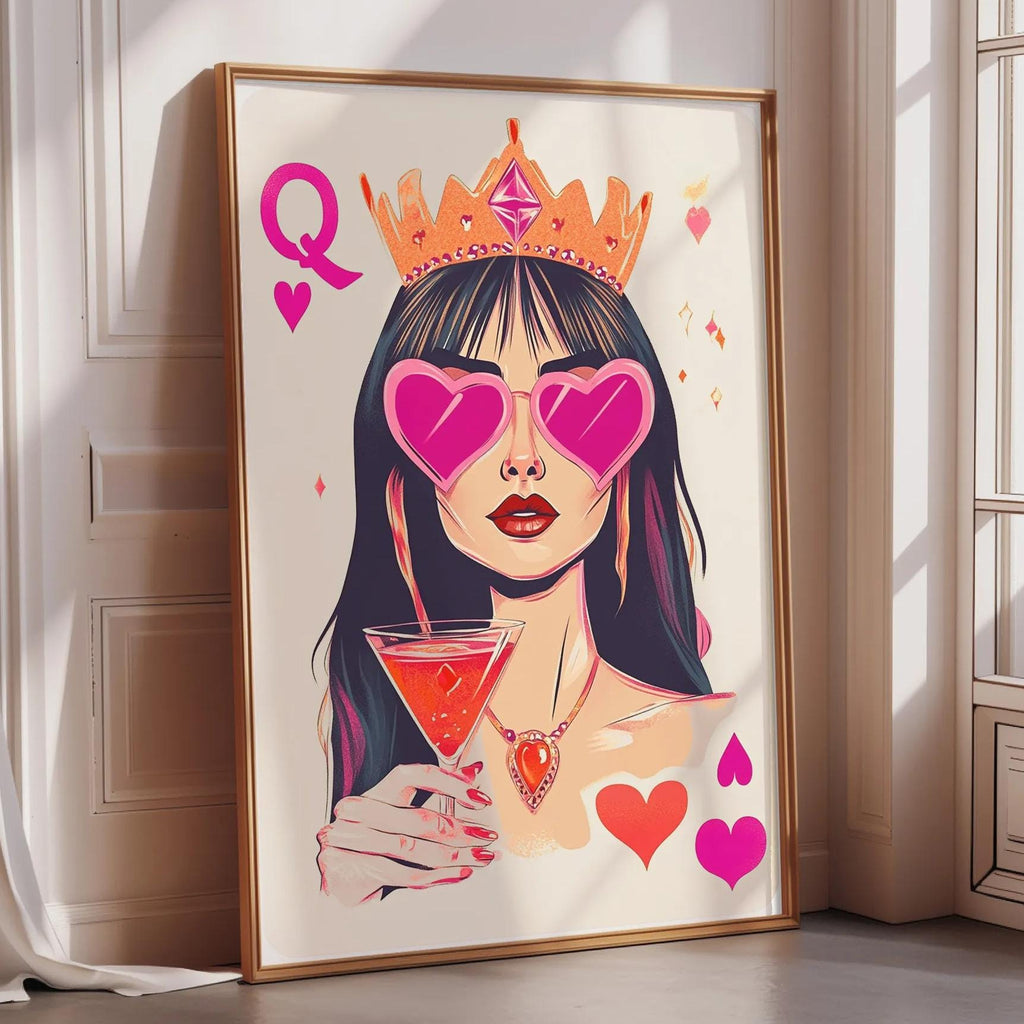 A framed illustration of a woman wearing a crown and pink heart-shaped glasses, holding a martini glass.