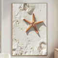 a large framed picture of a starfish on a wall in a living room.