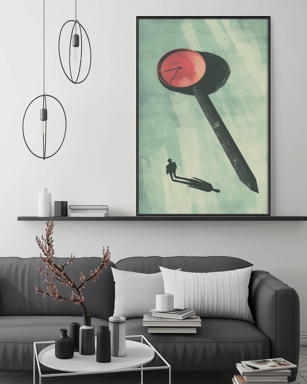 a modern living room with a gray sofa, a coffee table, and a large framed artwork depicting a stylized clock with a red face and a black shadow.
