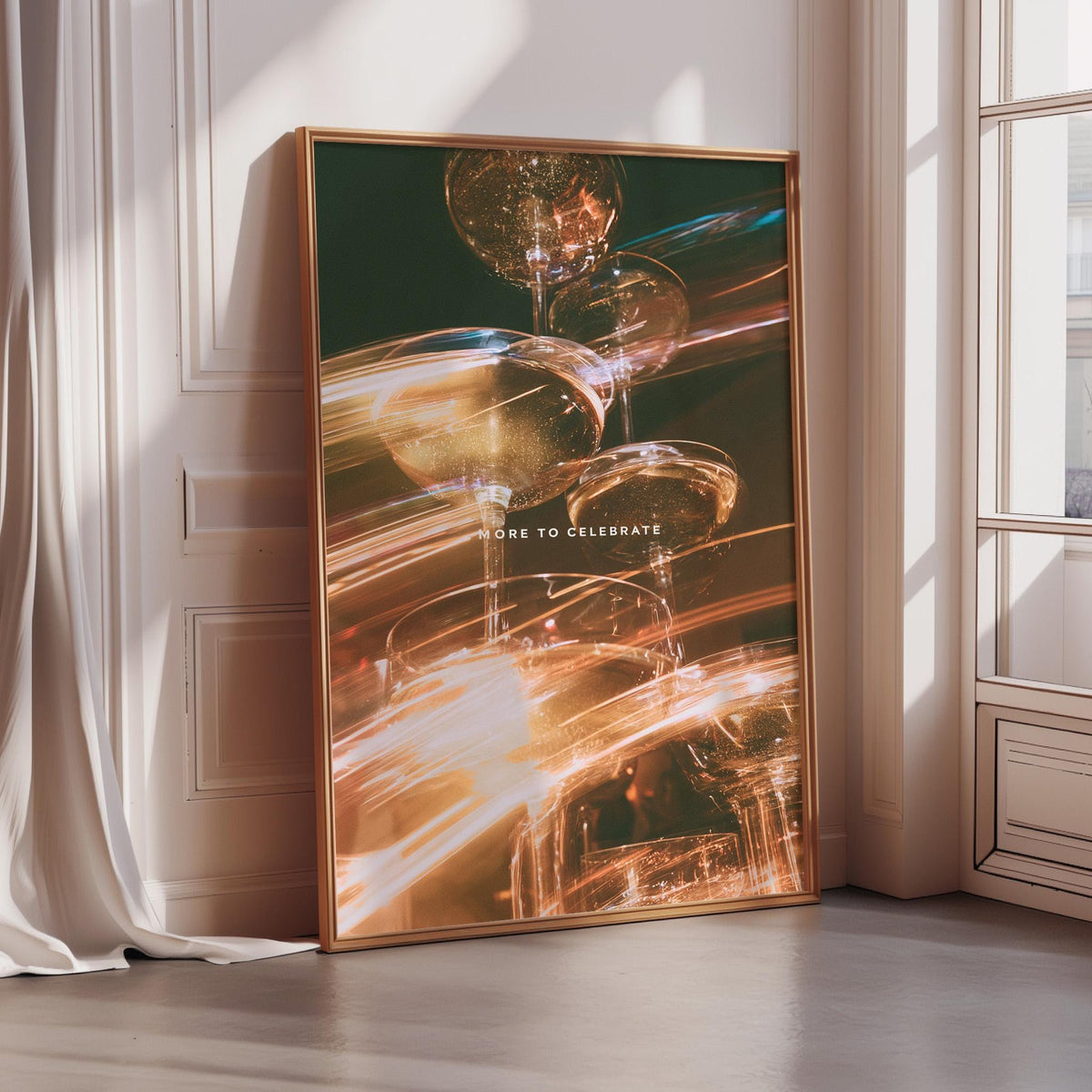 a large framed poster with a vibrant, abstract design of glass or crystal objects, including what appear to be champagne glasses or other glassware, set against a dark background with a warm, golden glow.