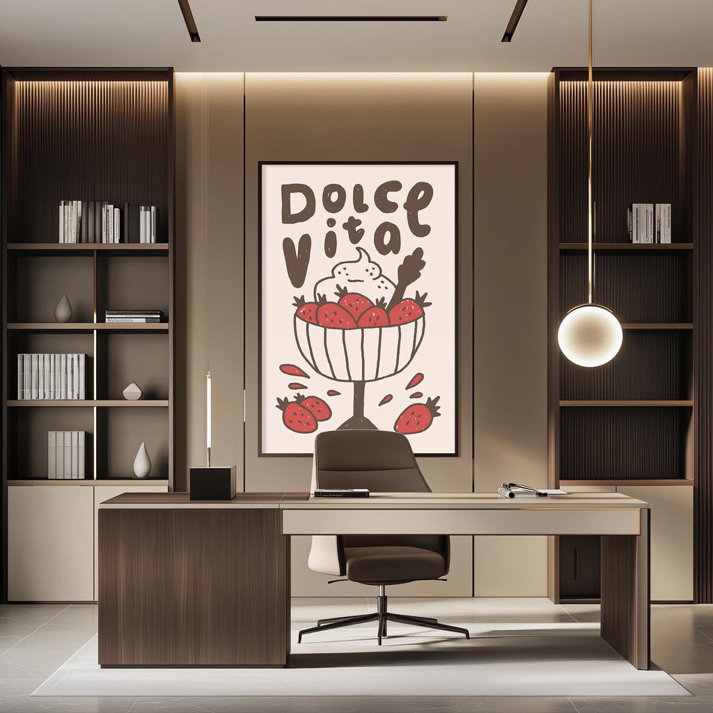 a modern office space with a desk, chair, and shelving units. The wall behind the desk has a framed poster with a strawberry design and the text "Dolce Vita".