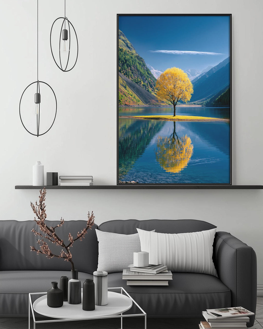 a large framed picture of a tree with yellow leaves, reflected in a calm lake, creating a serene and picturesque scene.