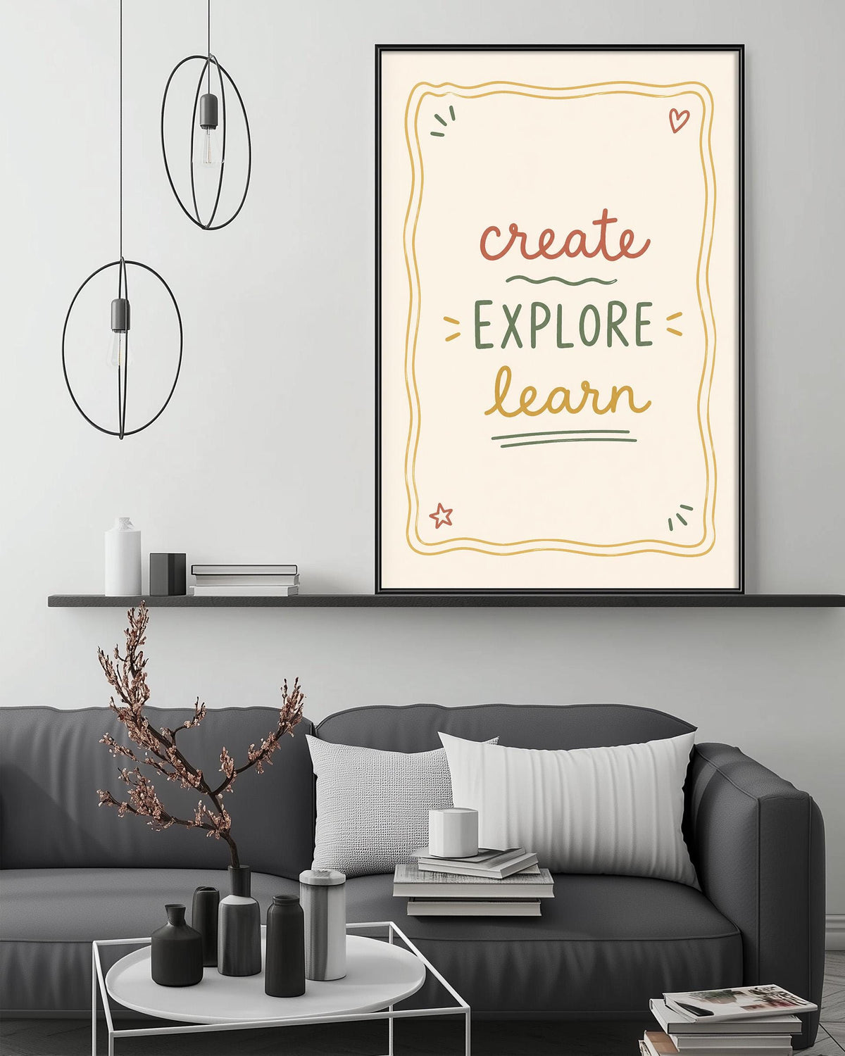 a cozy living room with a gray couch, a coffee table, and a framed inspirational quote on the wall.