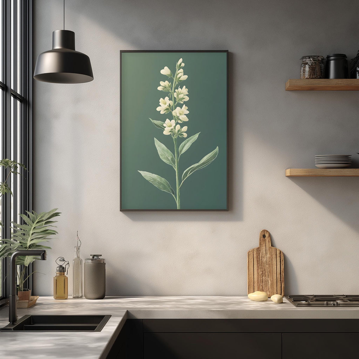 a kitchen counter with a framed picture of a flower on the wall above it. The counter has various kitchen items, such as a cutting board, a bottle, and a bowl.